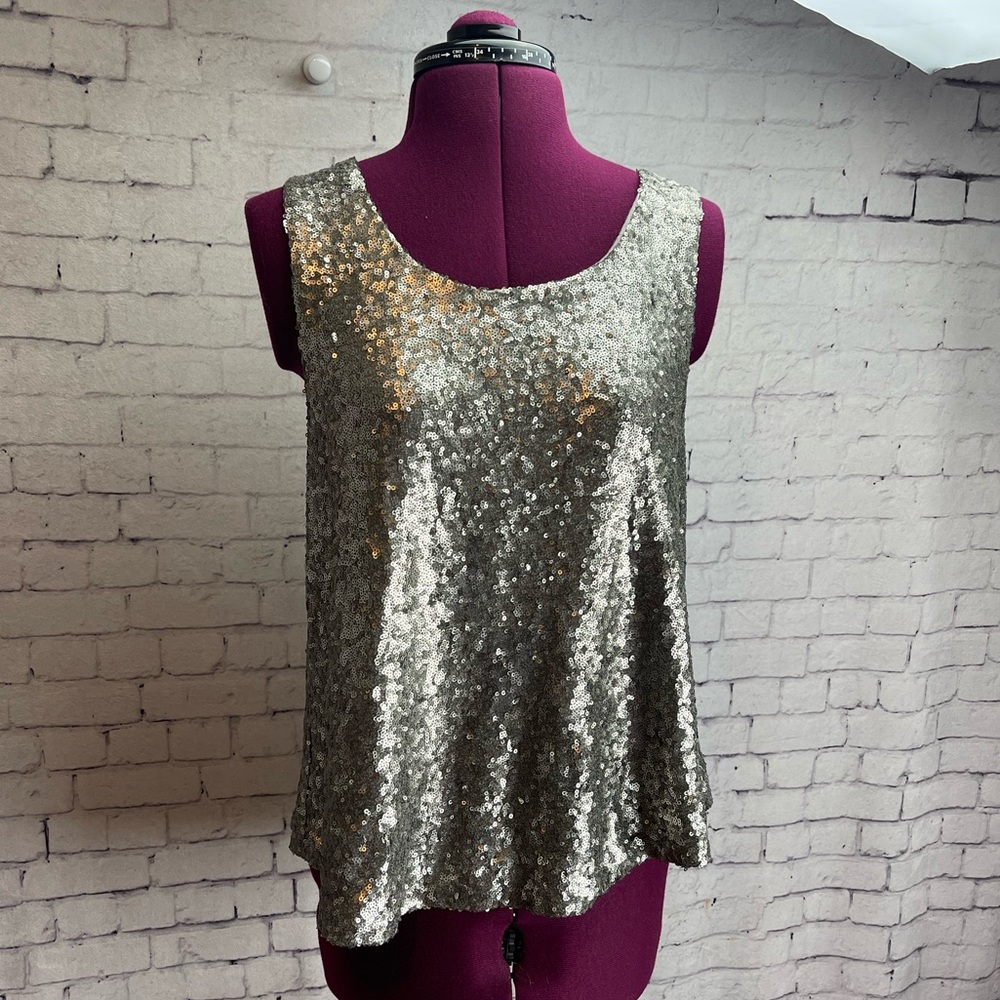BKE size medium silver sequin sleeveless blouse with bow details